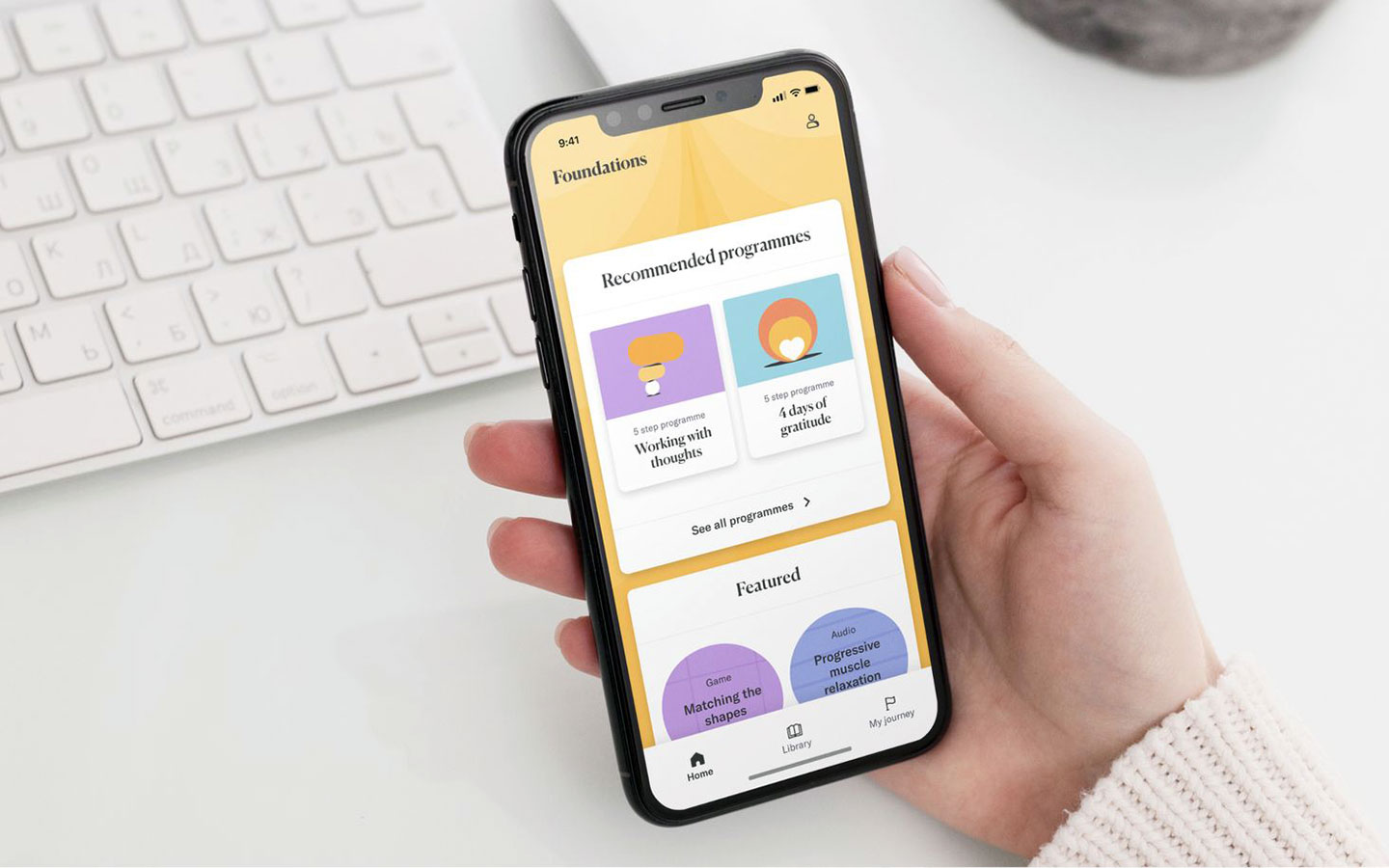 Koa Foundations app shown on a phone
